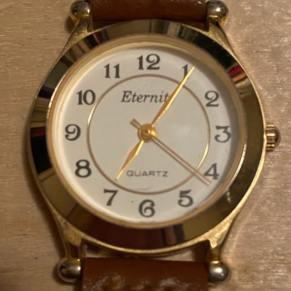 Gold toned watch w braided band